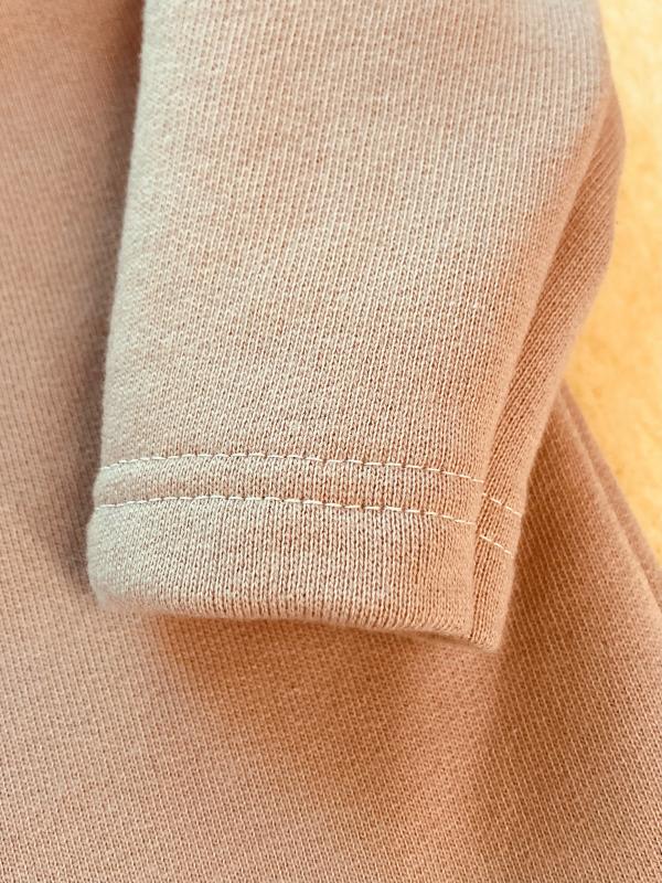 Sweatshirt mit Schulterknöpfung,  Farbe Puder